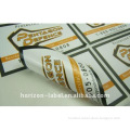 Double sided adhesive labels